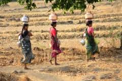 women carrying water